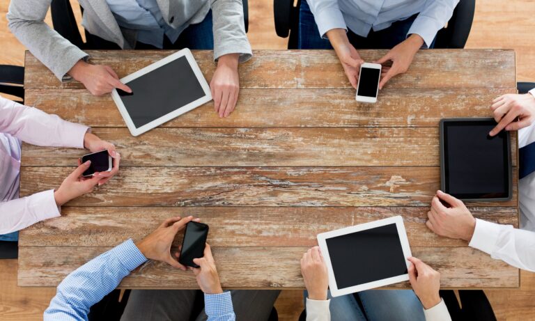 business team with smartphones and tablet pc